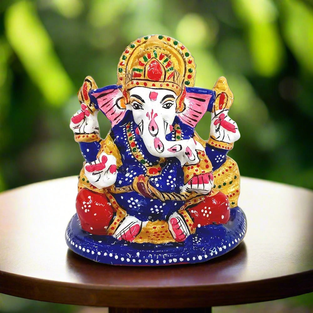 Meenakari Ganesha idol with hand-painted blue, red and white enamels, ideal for home decor, puja, car dashboard and gifting