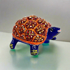 Handcrafted Meenakari metal tortoise Vastu showpiece front view for wealth.