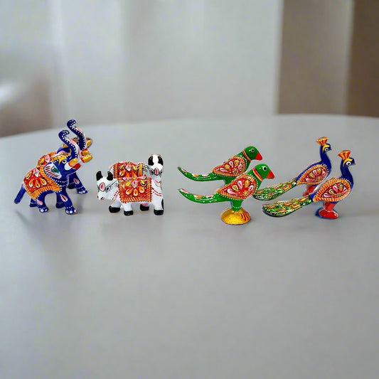  A set of 8 Meenakari metal toys, including elephants, cows, parrots, and peacocks, for Laddu Gopal.
