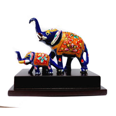 Meenakari painted mother and baby elephant figurine for festive decoration.