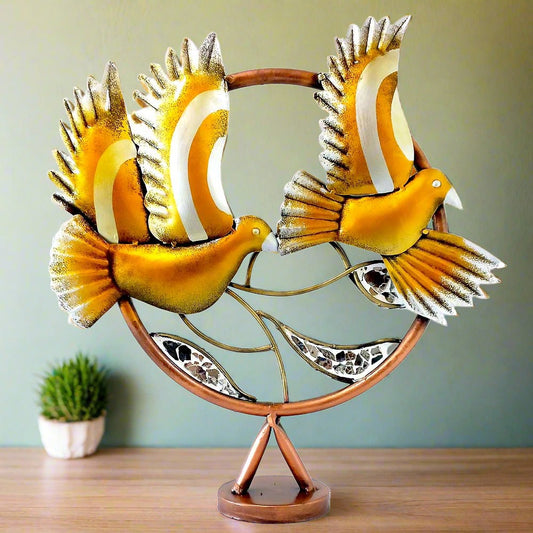A beautiful metal flying bird figurine, a showpiece for home decoration.