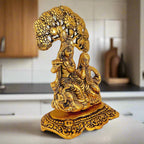 Metal Radha Krishna idol depicting love and devotion, finished in golden oxidised polish