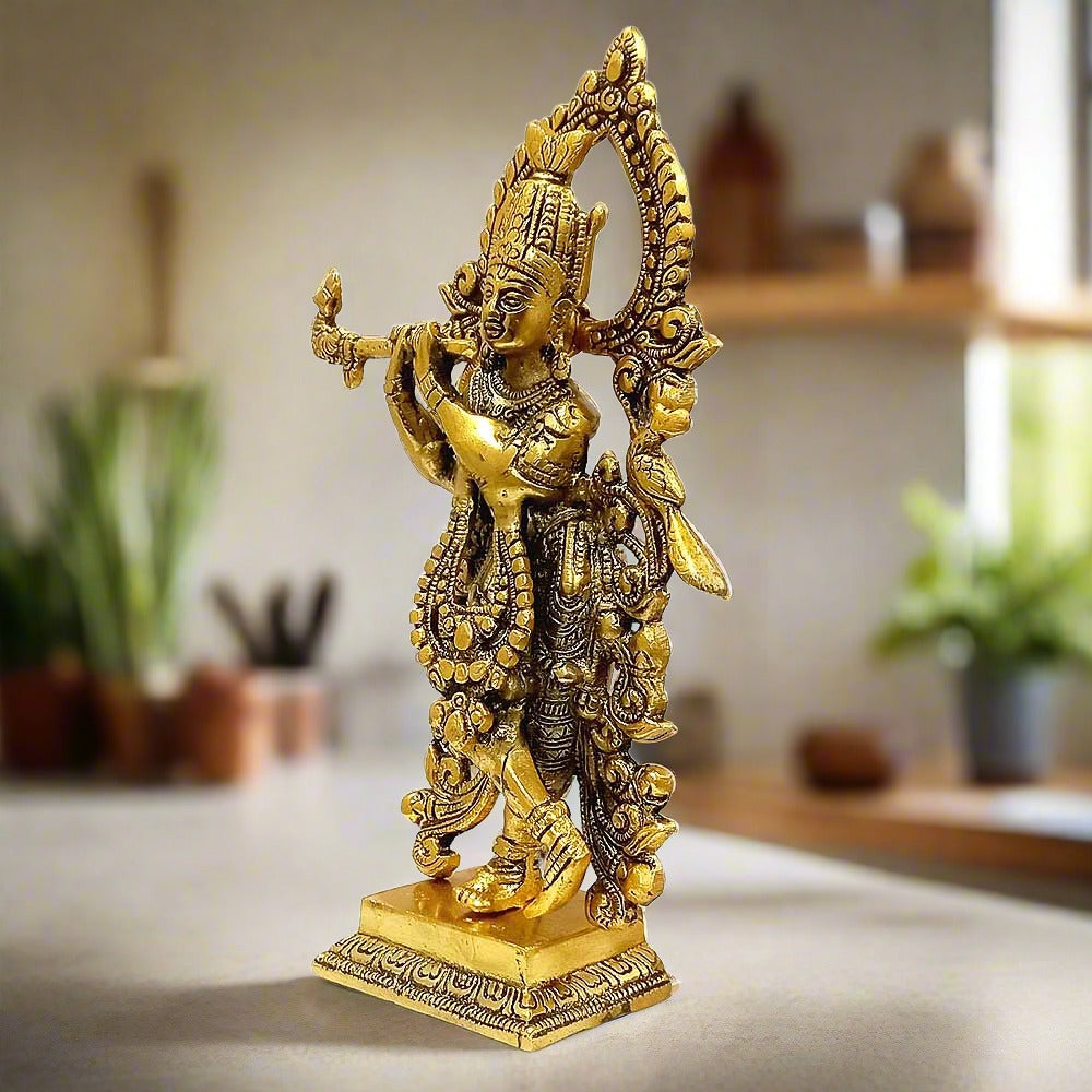 A metal Krishna Ji showpiece, perfect for home, office, or pooja room decor.