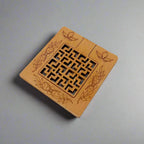 A newly designed and very beautiful wooden hand mirror with a unique lattice design.