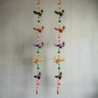 A pack of two beautiful peacock toran door hangings, perfect for home decoration.