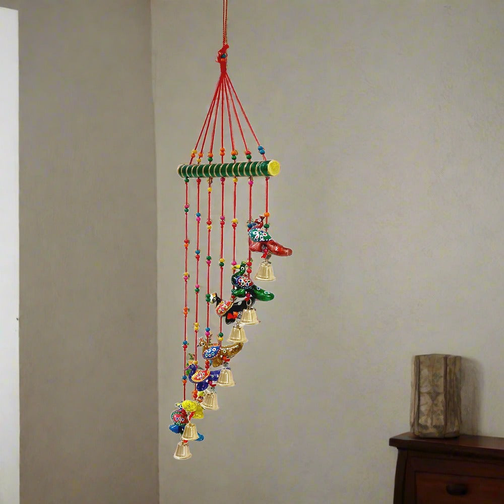 Artistic peacock toran wall hanging crafted in paper mache, perfect as a thoughtful gift.