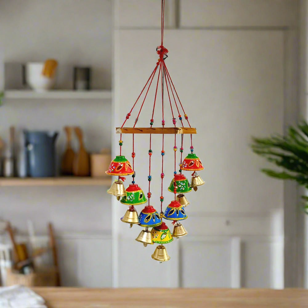 Papermache wind chime toran handcrafted for adding color and sound to any living space.