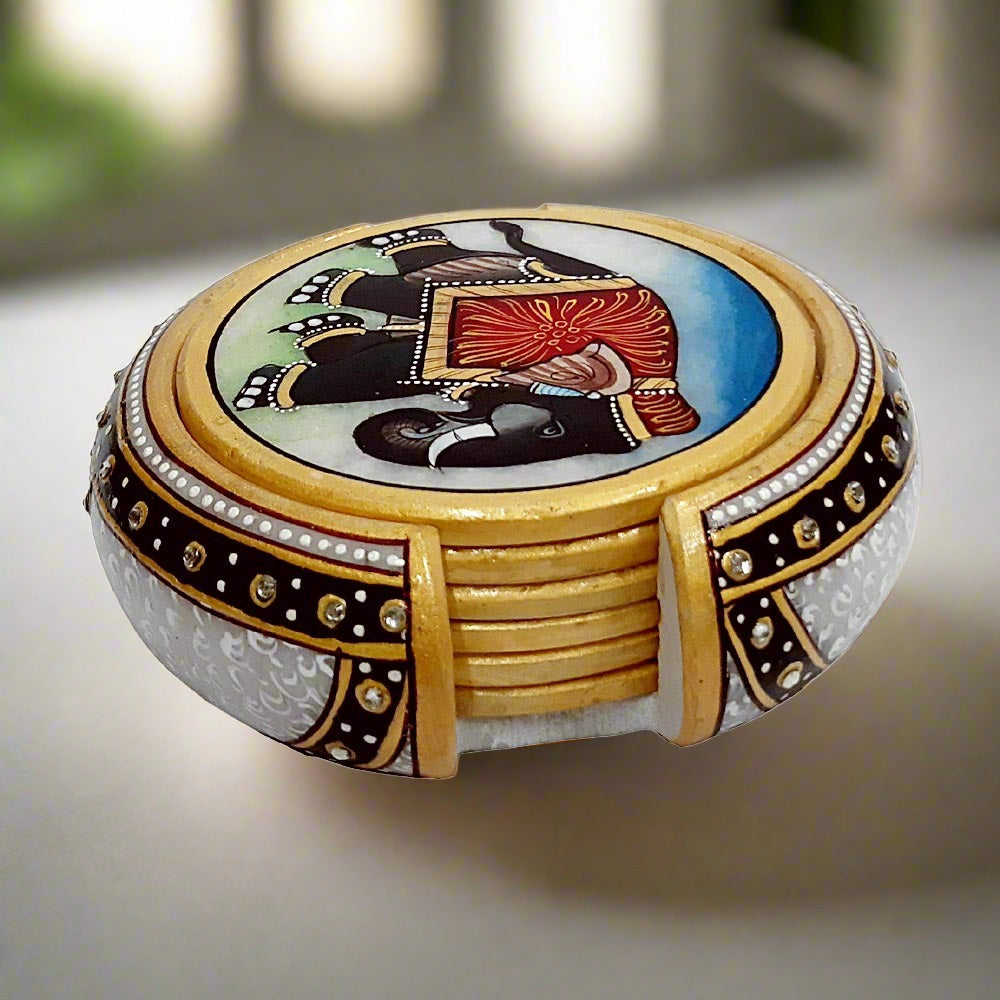 Premium-quality marble coaster set with elephant hand painting and studded white kundan holder