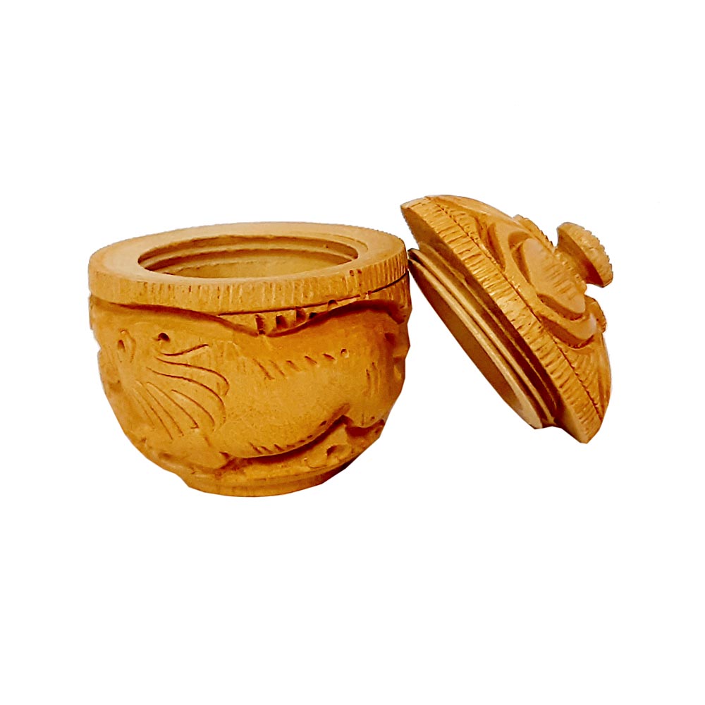 Carved wooden kumkum box open, pooja sindoor holder. 