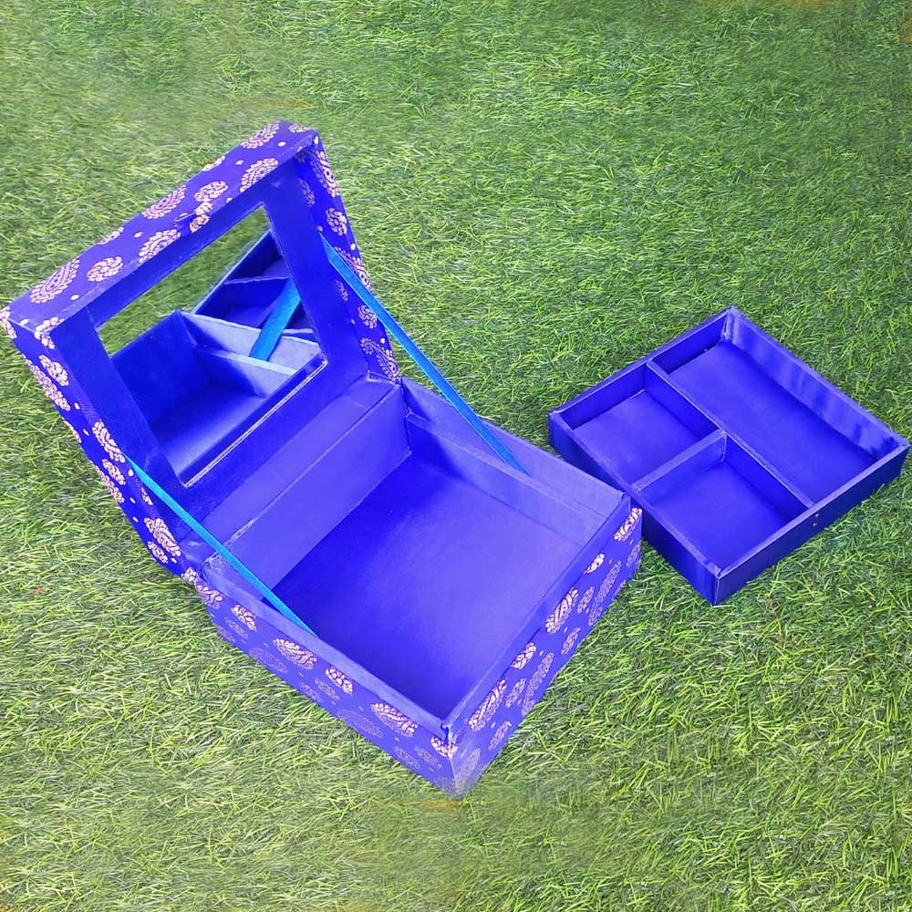 Silk fabric makeup box decorated with detailed zardosi embroidery, ideal for wedding gifts.