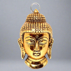 Small metal Buddha head wall hanging with long-lasting golden oxidize polish, ideal for return gifts.