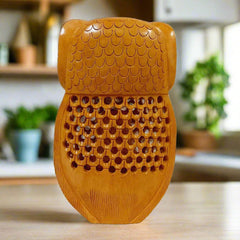 A spectacular wooden owl showpiece carved from a single piece of wood.