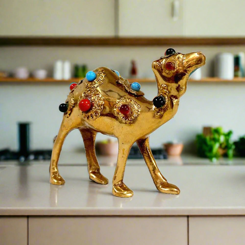 Detailed solid brass camel figurine decorated with gemstones, authentic Jaipur handicraft decor.
