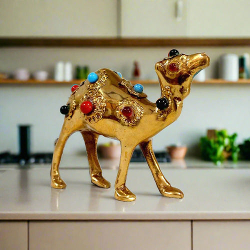 Detailed solid brass camel figurine decorated with gemstones, authentic Jaipur handicraft decor.