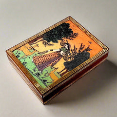 A teak wood jewelry organizer box with a handcrafted lady design painting, perfect for storing earrings and chains.