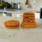 Traditional Dani wood Sindoor box with intricate carving, used for storing vermilion in Indian rituals.