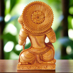 Traditional wooden Hanuman ji idol with intricate carvings on crown, mace, and garland