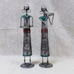 Traditional metal tribal candle holder set decorated with emboss painting and silver oxidized color, enhancing cultural home aesthetics.