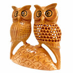 Detailed all-around carving on wooden owl pair symbolizing prosperity good luck gifting item