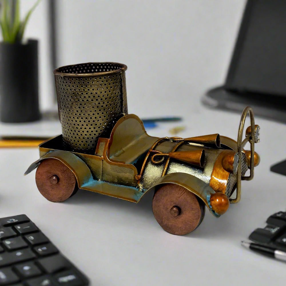 Vintage car design metal pen stand with antique hand painting, featuring circular holder for pens and pencils.