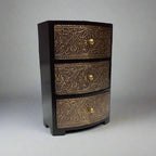Vintage look 3-layer drawer box made of wood and metal with antique metal sheet on top and front, decorated with beautiful flower leaf design.