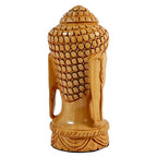 Wood carving buddha head back side view.