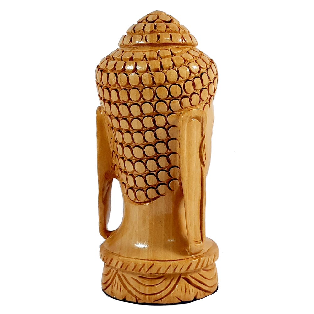 Wood carving buddha head back side view.