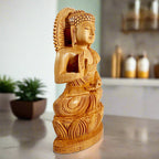 Seated wooden Buddha statue side view, fine wood carving details.