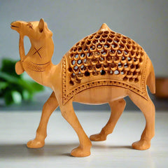 Handcrafted wooden camel statue featuring perfect shape, intricate carving, and lattice pattern with fine undercut design.