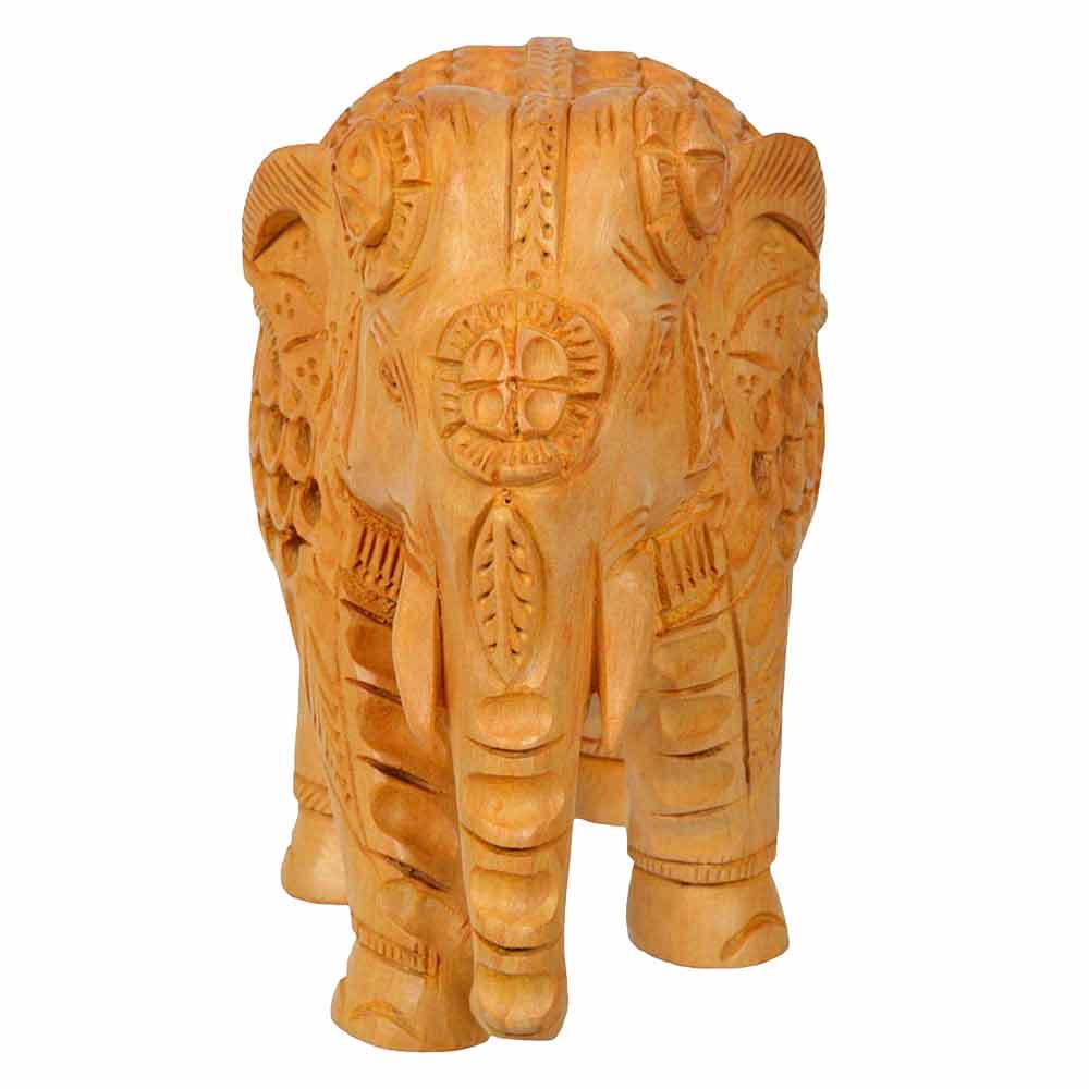 Wooden carved elephant idol with detailed undercut artwork.