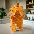 A very beautiful wooden carved elephant with a baby elephant inside, a perfect gift for any occasion.
