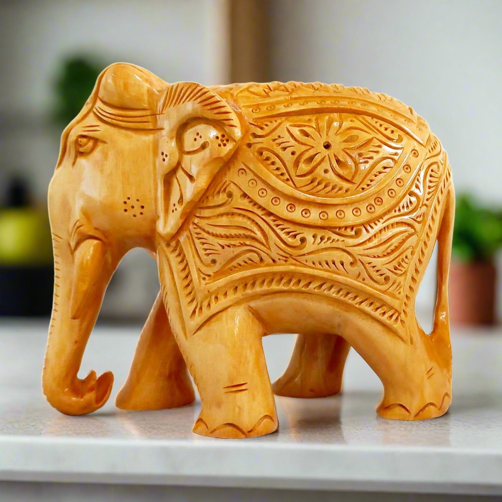 Wooden carving elephant statue handcrafted from Kadamba wood by Jaipur artisans.