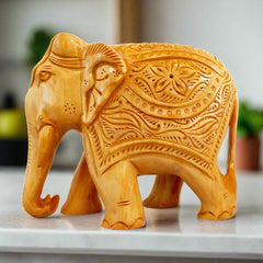 Wooden carving elephant statue handcrafted from Kadamba wood by Jaipur artisans.