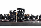 A complete set of wooden chess pieces in the Ambabadi style, along with a 15-inch playing board.
