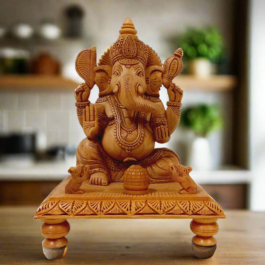 Wooden chowki Ganesh ji idol made from kadam wood with finely hand-carved details, featuring Ganesh sitting with two rats and a laddu.
