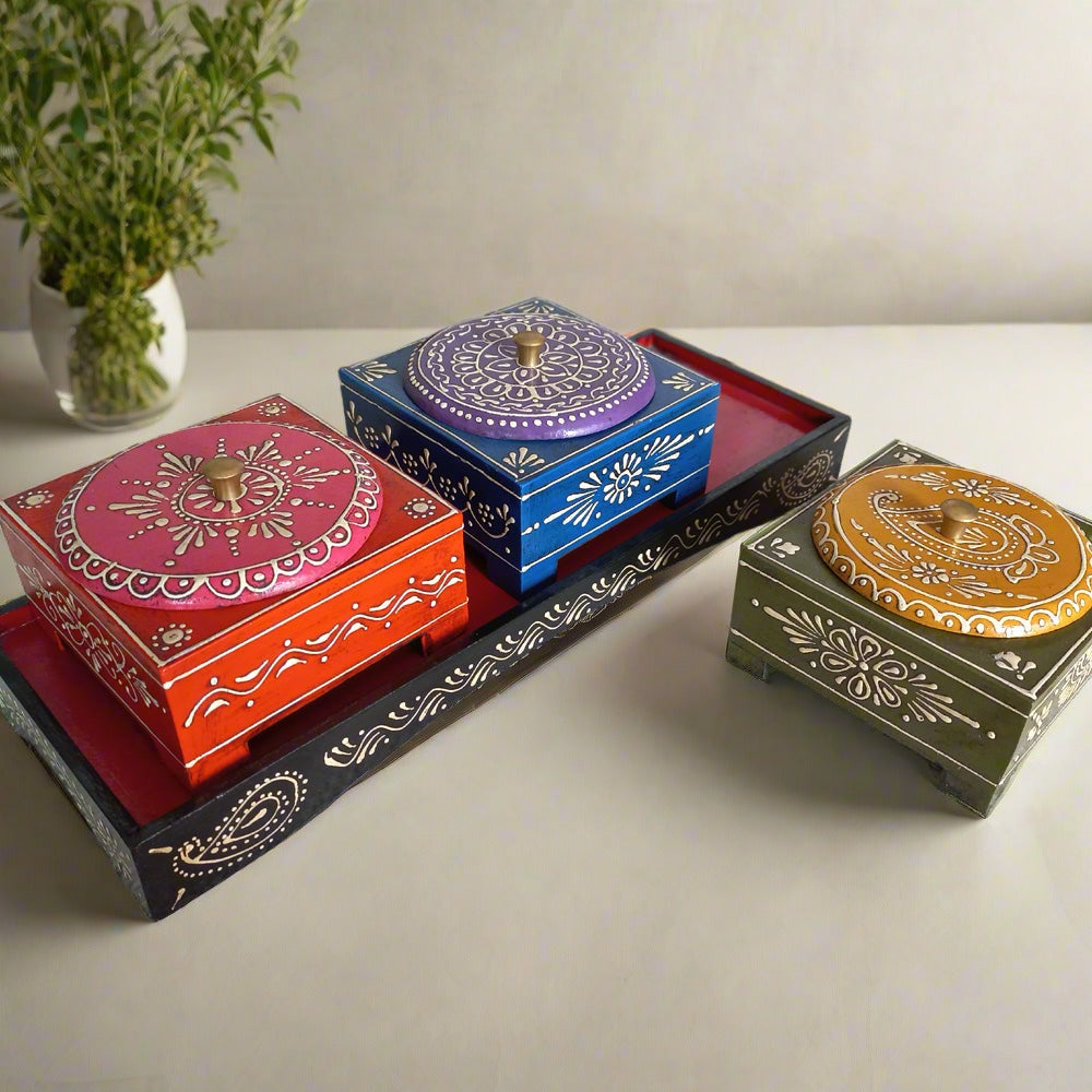 Wooden dry fruit box with three separate steel bowls, combining traditional design with practical use.

