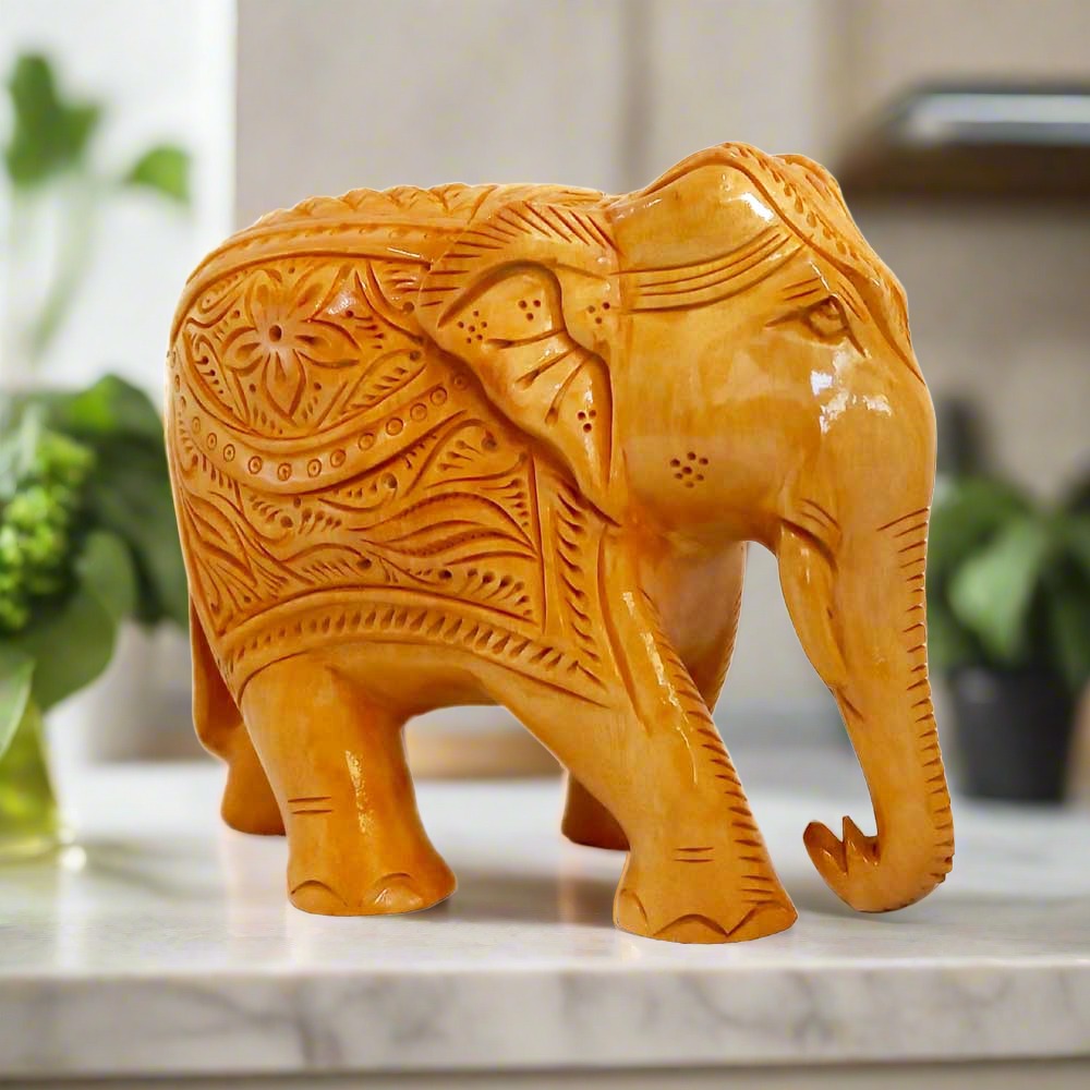 Artistic wooden elephant decor piece ideal for living room, office, or gifting.