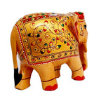 Elegant wooden elephant showpiece with embossed artwork, handcrafted by Indian artisans