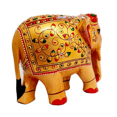 Elegant wooden elephant showpiece with embossed artwork, handcrafted by Indian artisans