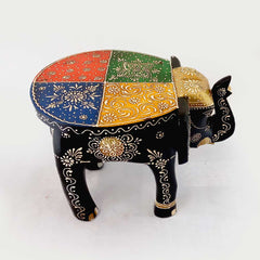  A wooden elephant stool with wonderful emboss painting, a unique piece for interior design.