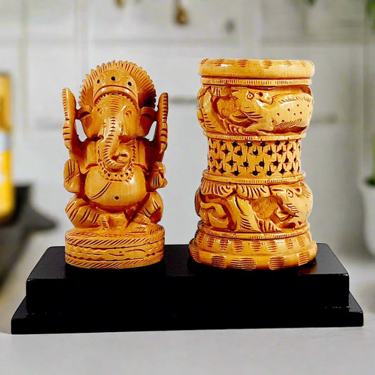 A beautifully crafted wooden Ganesh pen holder, perfect for office and home decor.
