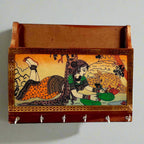 Handmade wooden key holder with gemstone painting 6 hooks and paper tray front view.