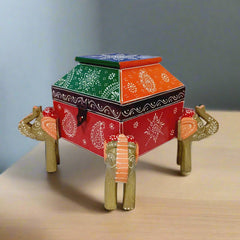 Traditional wooden jewelry box hand-painted with intricate designs, featuring four elephants on all sides and antique finish.