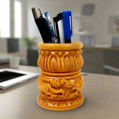 A wooden pen holder with a lotus carving that can also be used as a flower pot for home decoration.