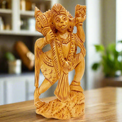 Wooden Hanuman ji idol standing with mountain in one hand and mace in the other