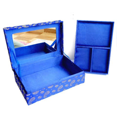 A handmade jewelry storage box decorated with beautiful zardosi hand embroidery and golden wire.
